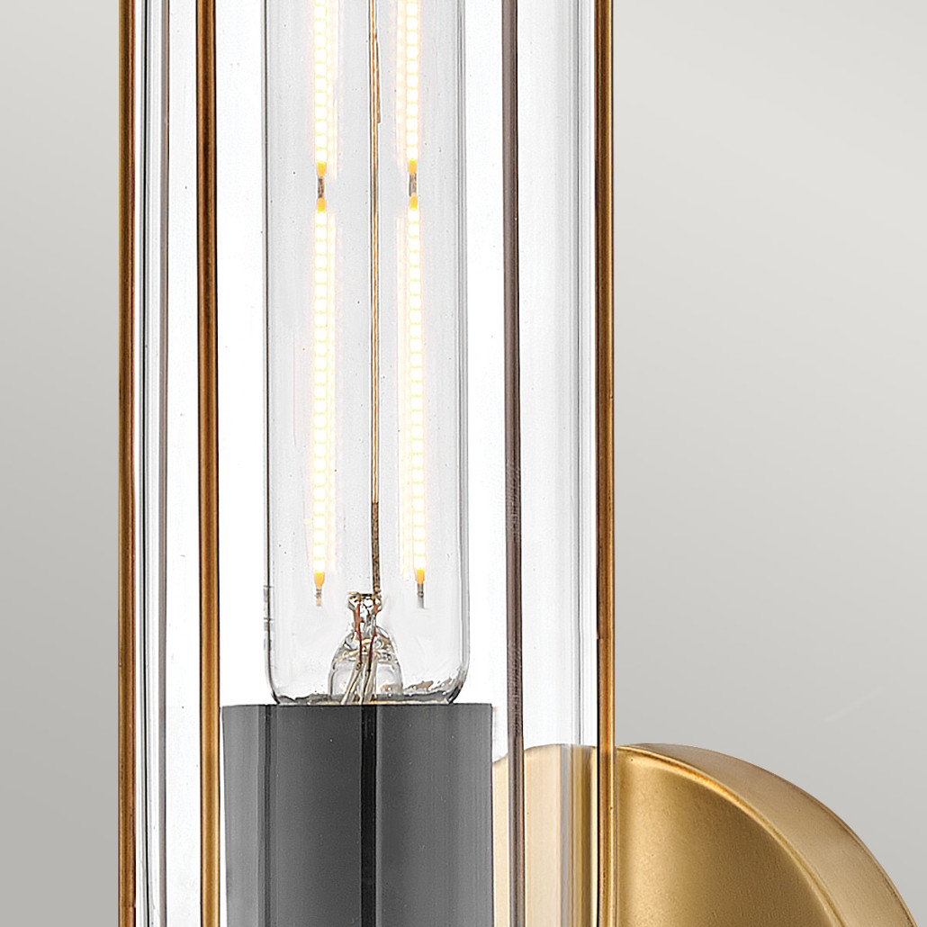 Бра для ванных комнат с прозрачным цилиндрическим плафоном на круглом основании Hinkley