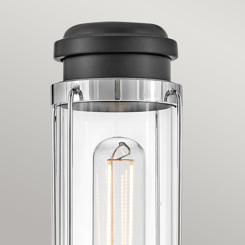 Бра для ванных комнат с прозрачным цилиндрическим плафоном на круглом основании Hinkley