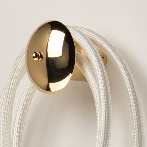 Бра с круглым золотистым основанием и белыми изогнутыми световыми линиями Luke Lampco Tracer Lamp