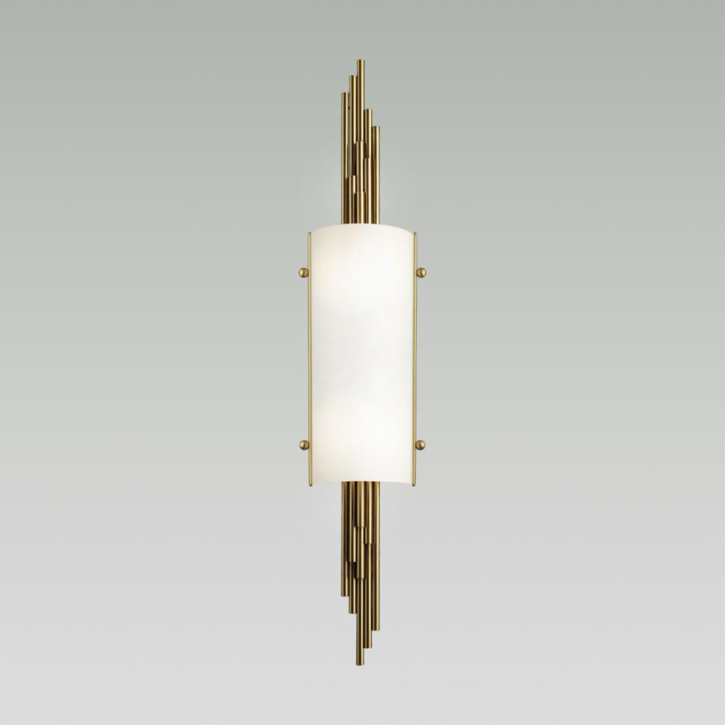 Бра с цилиндрическим белым плафоном на бронзовом основании с вертикальным декором из металлических трубок Sohne
