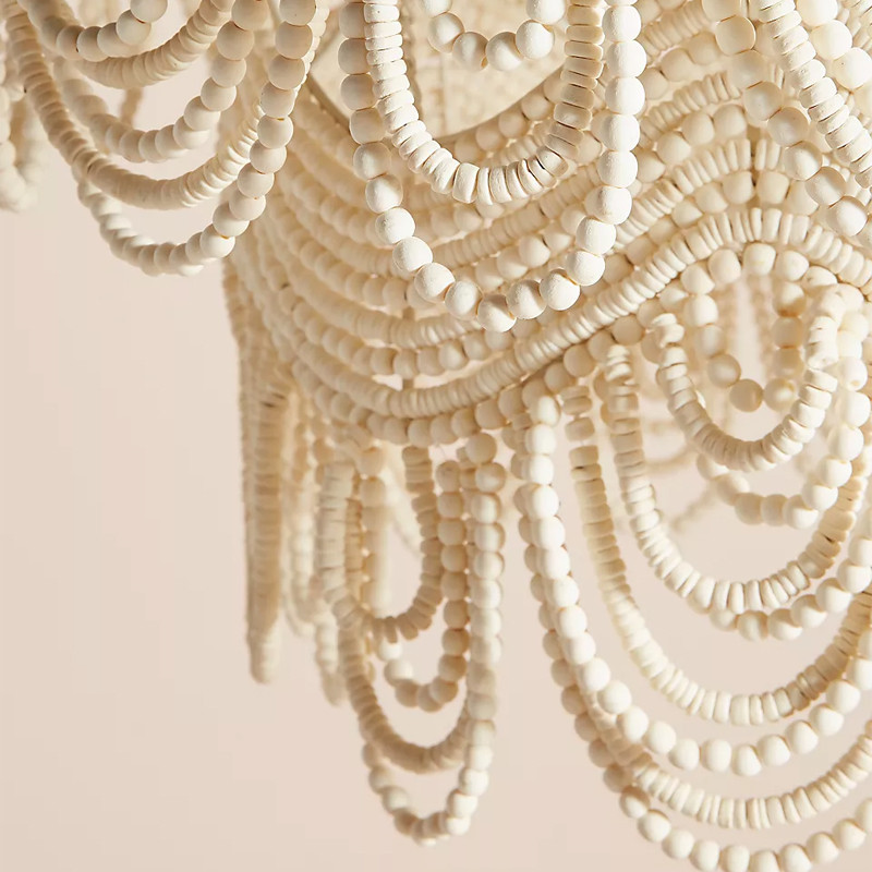 Двухъярусная круглая люстра волнистой формы украшенная белыми бусами Azure Beads Chandelier