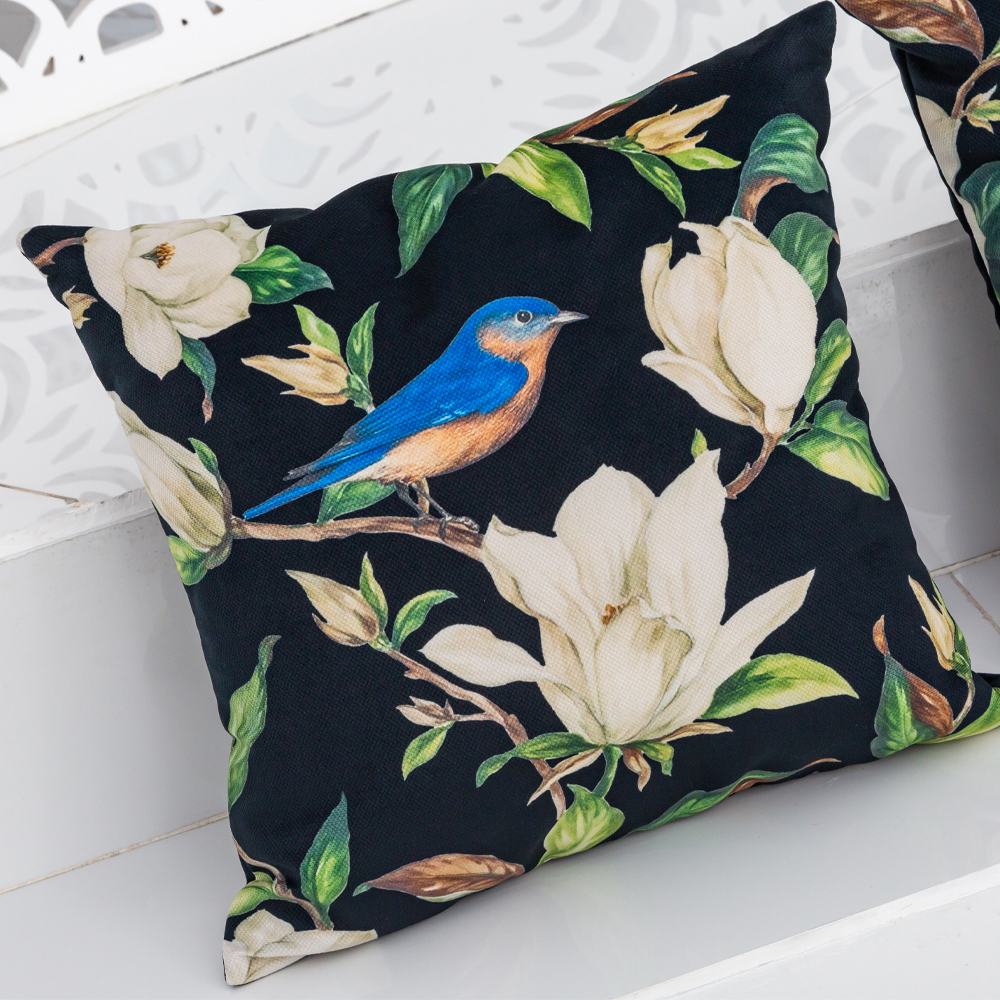 Декоративная подушка чёрная с изображением птицы в саду Blooming Blue Birds