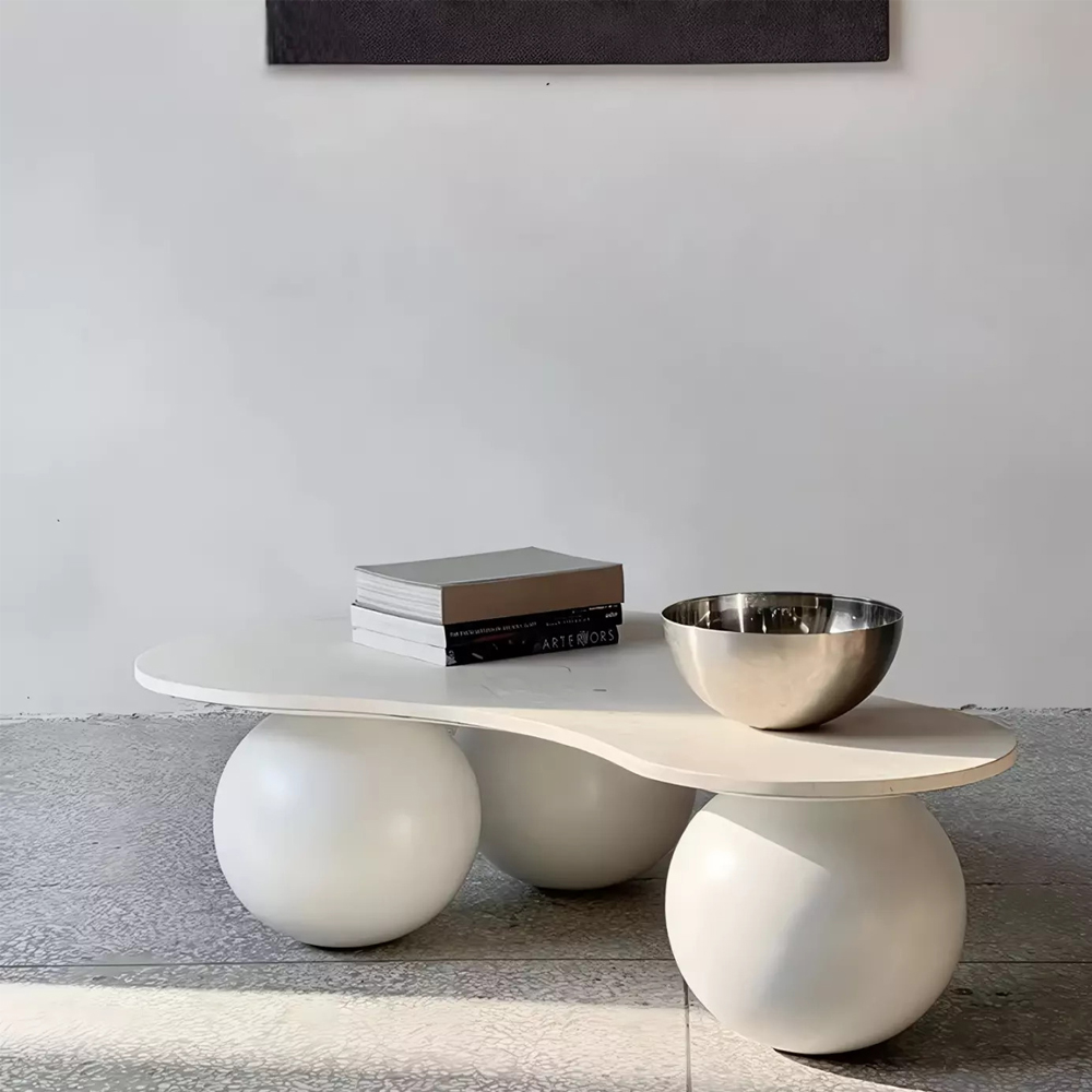 Дизайнерский журнальный стол с изогнутой столешницей на круглых ножках Rigilyr