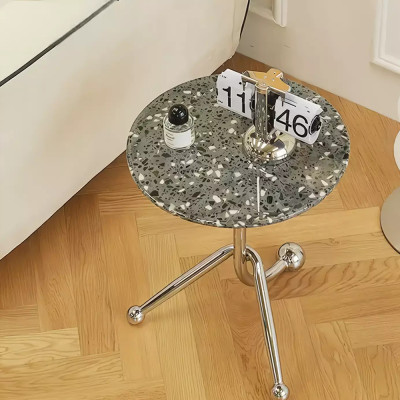 Дизайнерский журнальный стол с круглой столешницей на изогнутых стальных ножках Obafaby