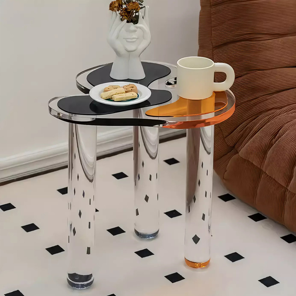 Дизайнерский журнальный стол с фигурной столешницей на 3-х прозрачных ножках Rahakif