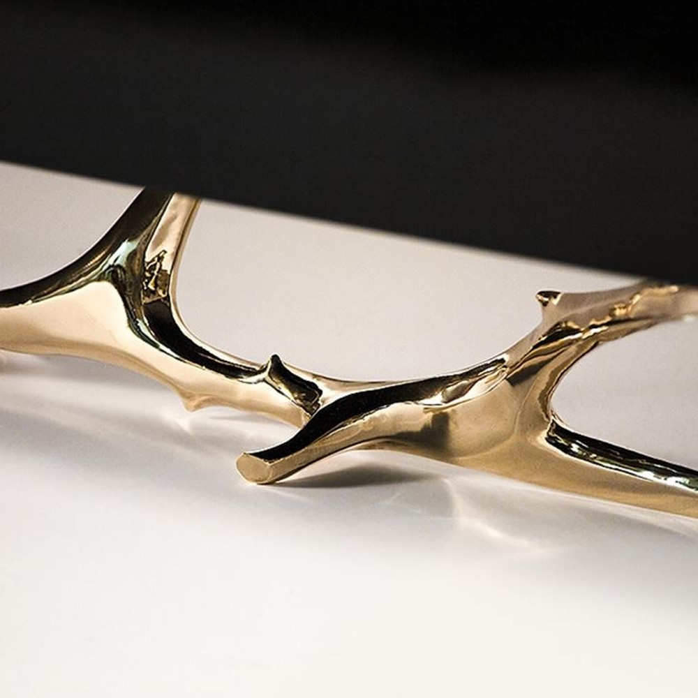 Дизайнерский комод чёрный глянцевый с основанием в виде золотых ветвей Meta Credenza