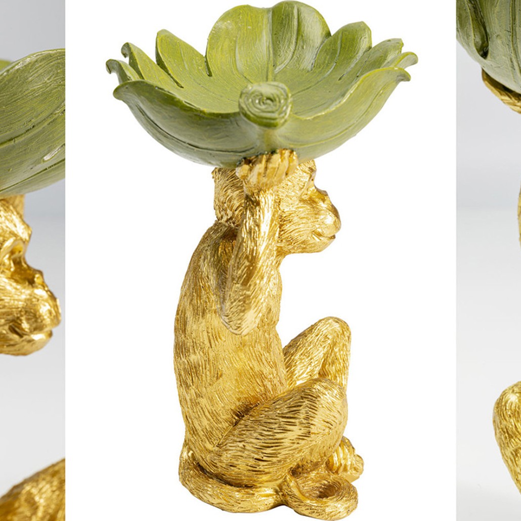 Конфетница Golden Monkey holding a leaf