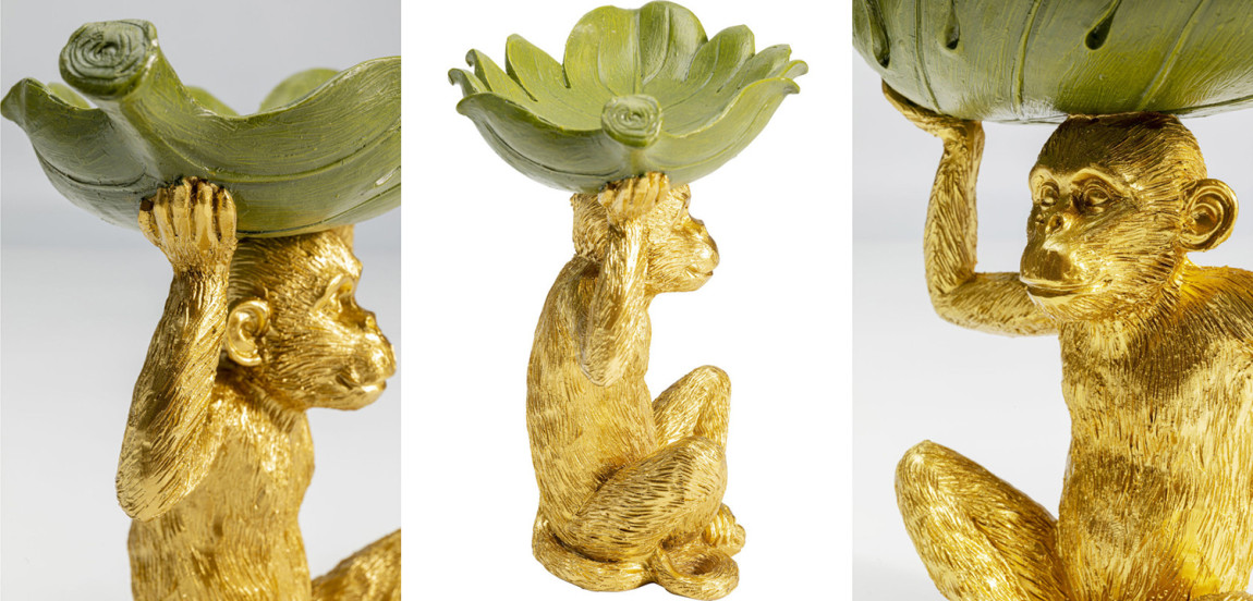 Конфетница Golden Monkey holding a leaf