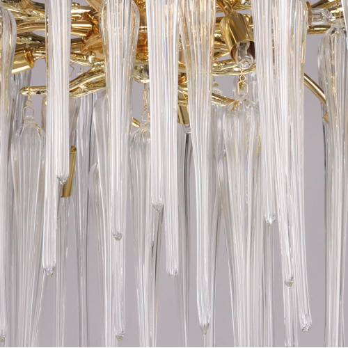 Люстра золотого цвета с декоративными ветками и длинными прозрачными стеклянными подвесами в форме сосулек Droplet Chandelier