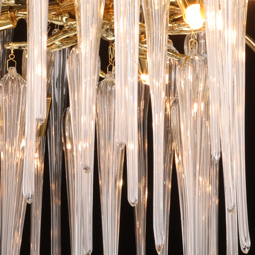 Люстра золотого цвета с декоративными ветками и длинными прозрачными стеклянными подвесами в форме сосулек Droplet Chandelier