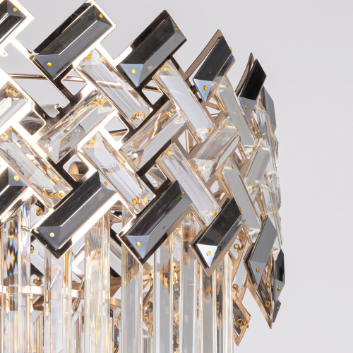 Люстра многоярусная с переплетенными металлическими элементами черного и золотого цвета и прозрачными хрустальными подвесками Empire Chandelier Crystal