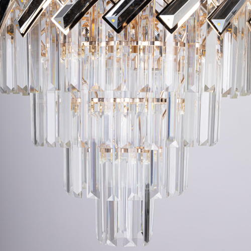 Люстра многоярусная с переплетенными металлическими элементами черного и золотого цвета и прозрачными хрустальными подвесками Empire Chandelier Crystal