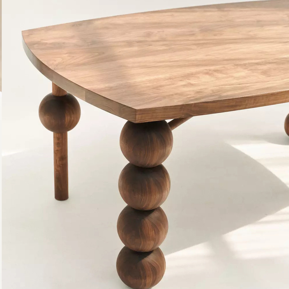 Обеденный стол деревянный с круглыми декоративными элементами на ножках Koko
