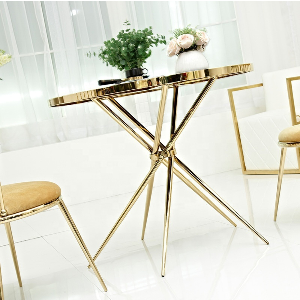 Обеденный стол с чёрной круглой столешницей на золотых ножках Rive Gauche Table