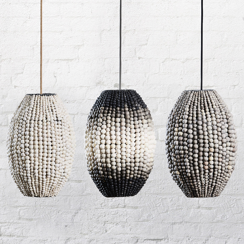 Подвесной светильник вертикальной овальной формы украшенный белыми круглыми бусинами Gradient Oval Pendant Lamp White